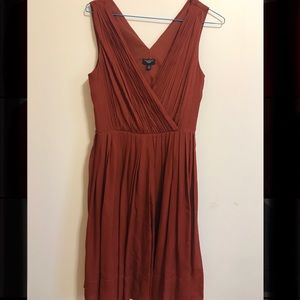 red pleated dress